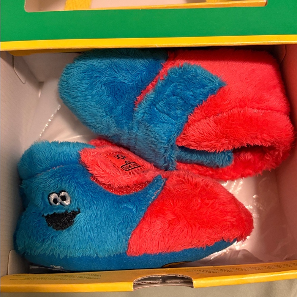 UGG Sesame Street Blue and Red Plush Slippers